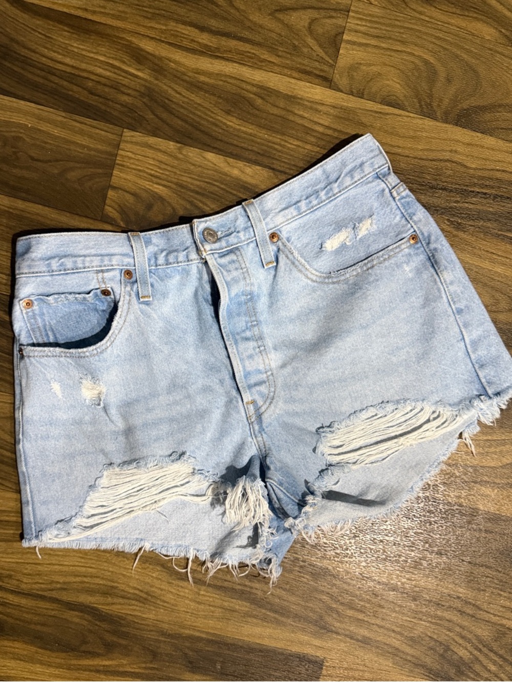 Levi's Faded Light Blue Ripped Denim Shorts